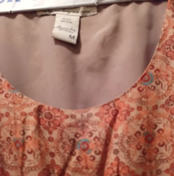 American Rag dress. 💯 Rayon (outer). 💯 polyester (lining). - Picture 2 of 6